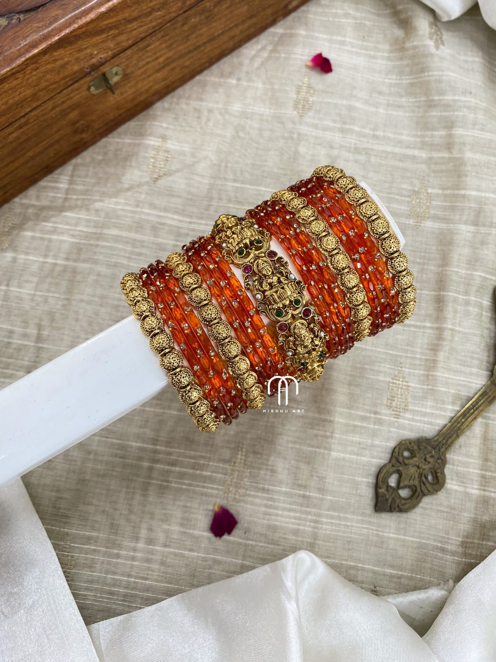 Ashta Lakshmi Budget 2.0 (Orange) from Bangle by Choice