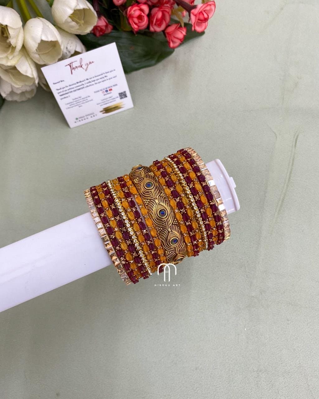 Mayil Peeli Bangles – Yellow And Maroon from Bangle by Choice